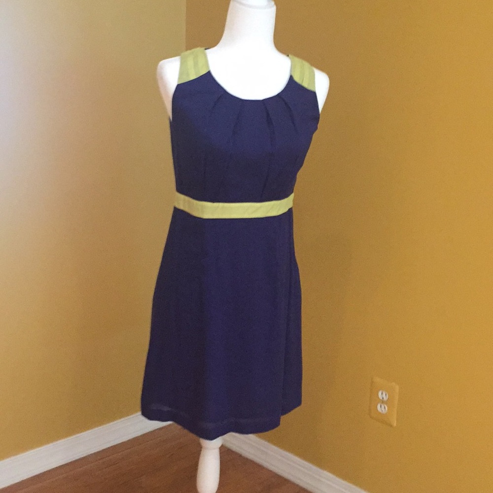 Sleeveless dress. Sweater listed separately